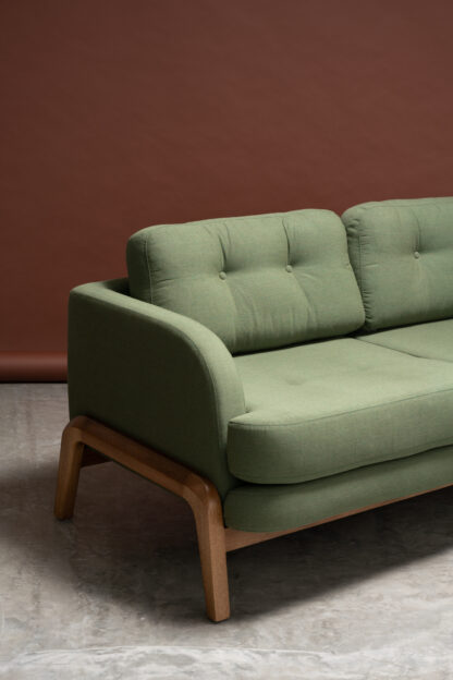sillón de diseño contemporáneo y de tela verde